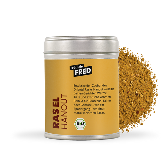 Ras el Hanout Dose mit fein gemahlener ockerfarbener Gewürzmischung