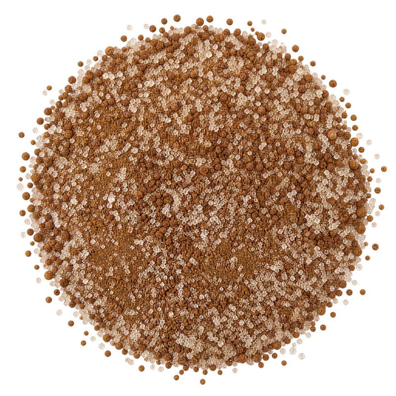 Zimtzucker – glitzernde Zuckerkristalle mit braunen Zimtkörnchen